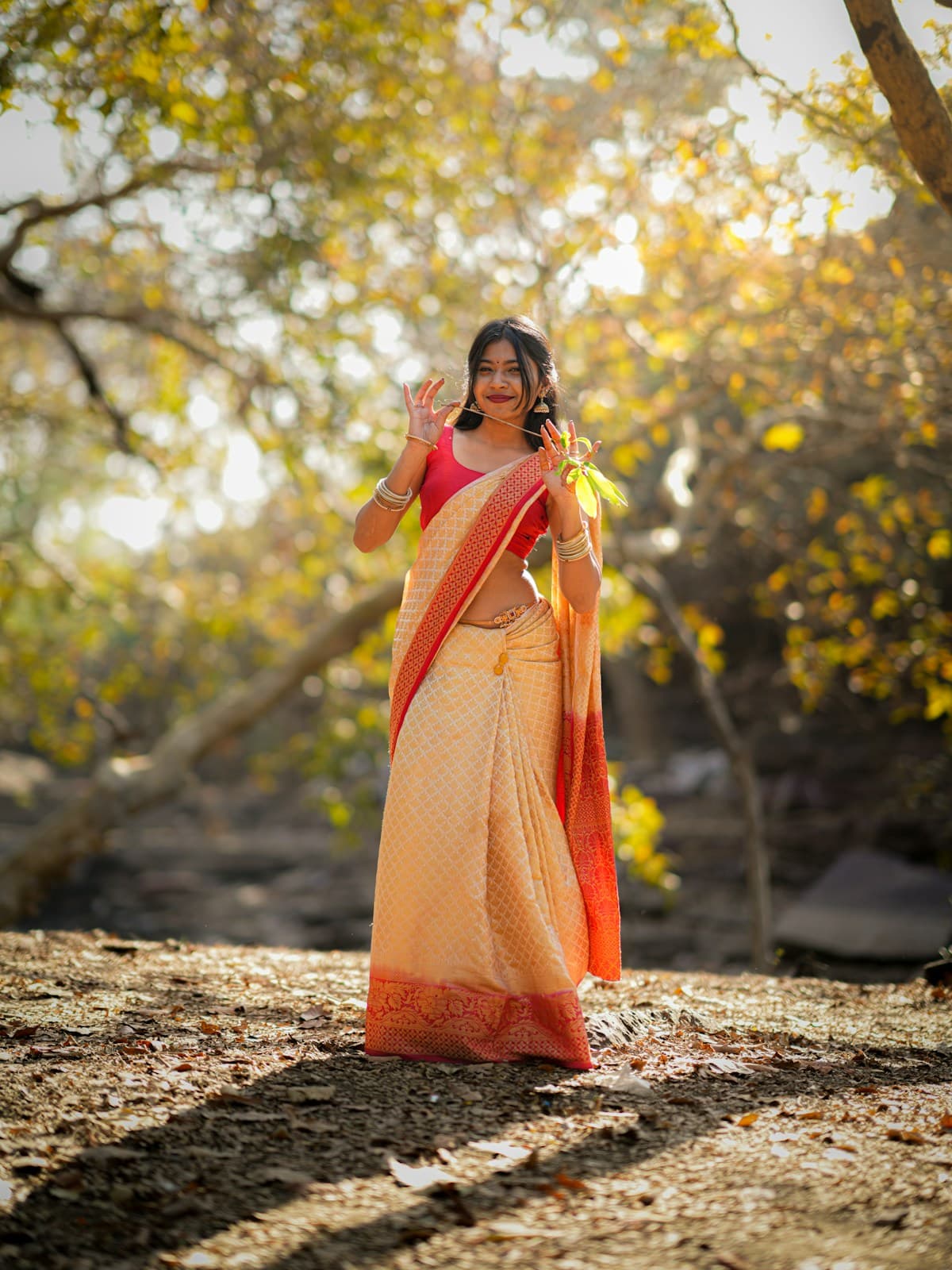 A woman in a handwoven saree wearing Abhirang jewellery